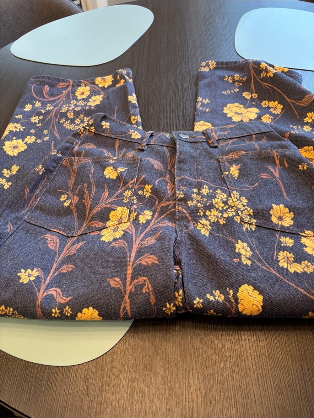 Womans Brand new without tags. Navy Floral Print Pants with Yellow Flower